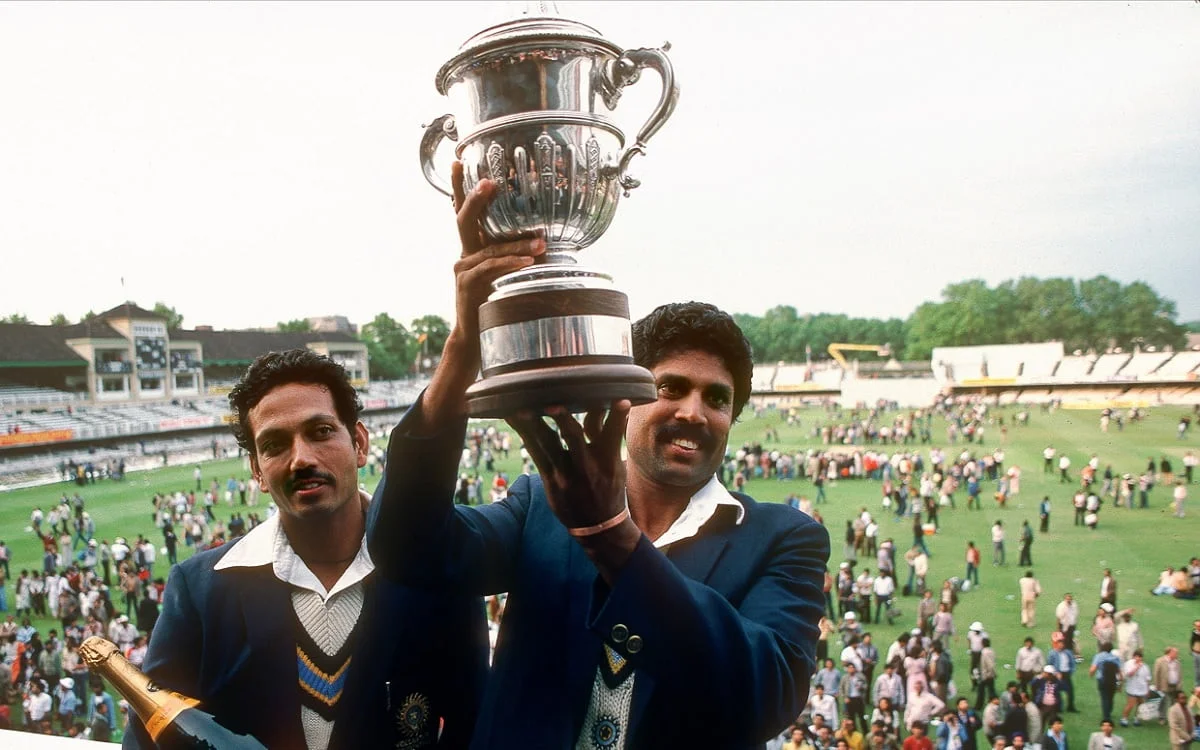 Kapil Dev holding the 1983 World Cup trophy