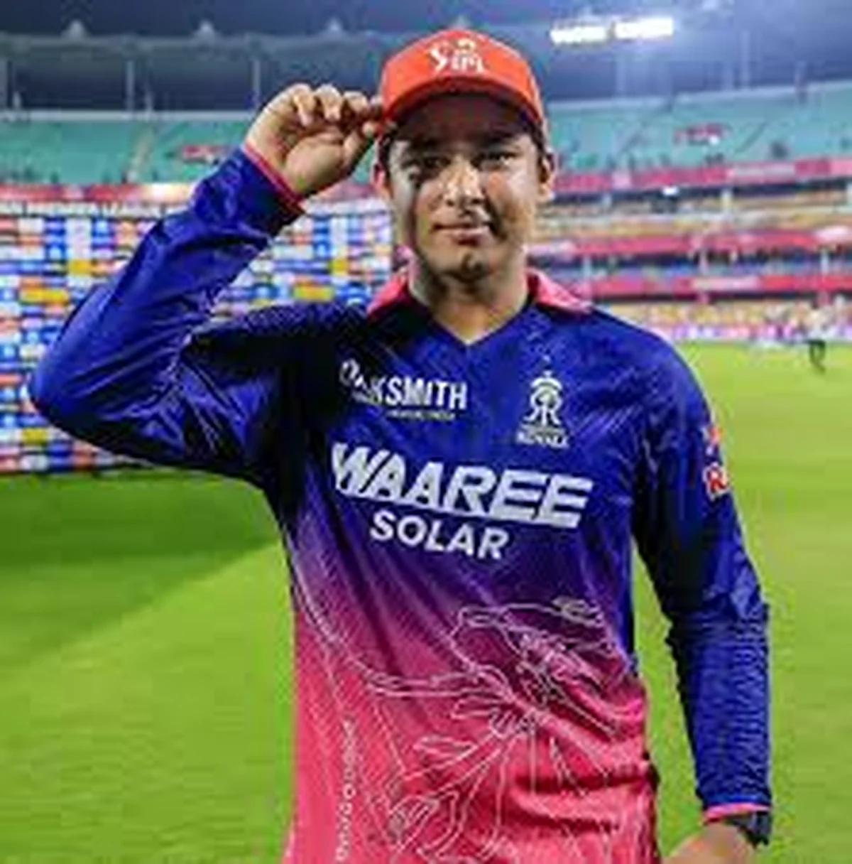 Vaibhav Suryavanshi in Rajasthan Royals jersey, acknowledging the crowd